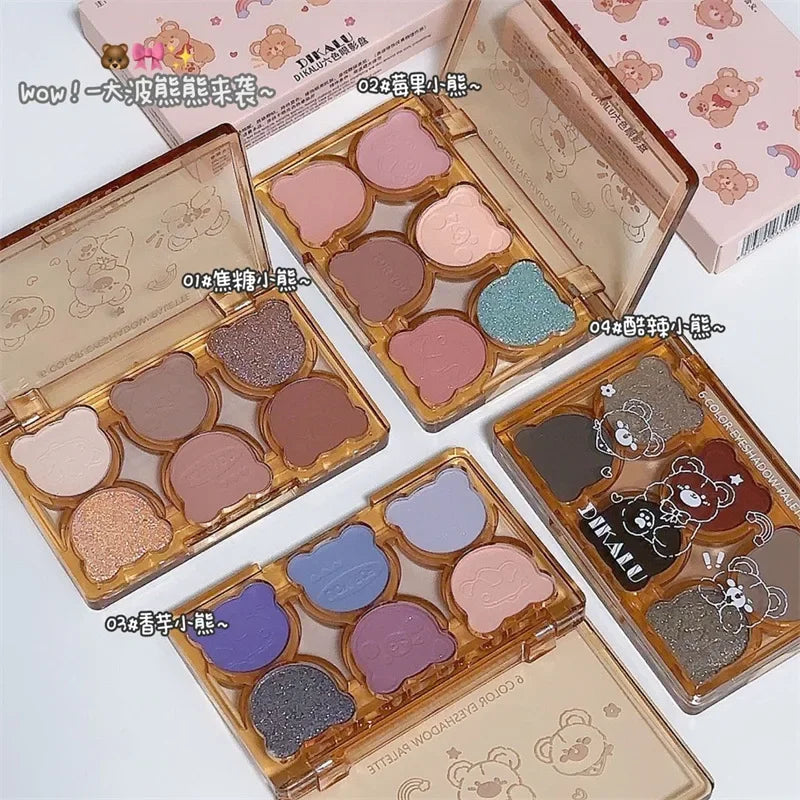 Blushimmer matte eyeshadow palette with six shades including smoky gray, red, black, and wine red eye makeup with shimmering finish.