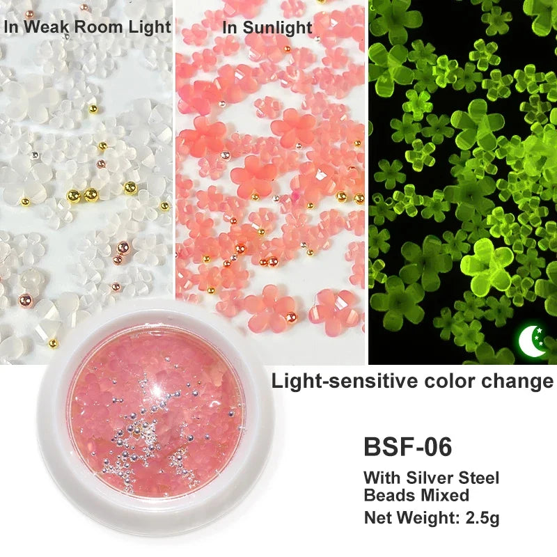 White acrylic flower nail art decorations with mixed size rhinestones and colorful gems for DIY manicure designs.