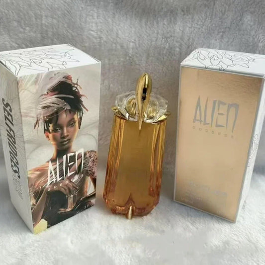 Thierry Mugler Alien Purple perfume for women in 90ml bottle, featuring purple, gold, and red accents, with a sleek, elegant design.