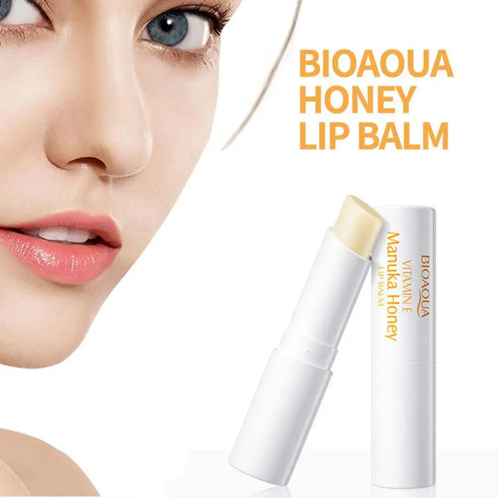 Blushimmer Vitamin E honey lip balm stick with nourishing, moisturizing formula for soft, crack-free winter lips.