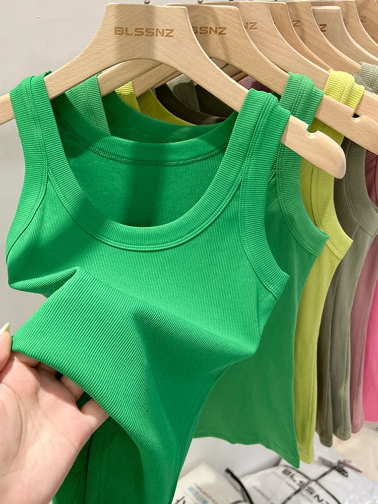 Zjaiss women's solid ribbed round neck tank top in a neutral color, featuring a fitted elastic design for summer wear.