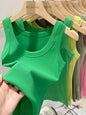 Zjaiss women's solid ribbed round neck tank top in a neutral color, featuring a fitted elastic design for summer wear.