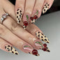 Blushimmer 3D bowknot pearl nail art set with leopard and French nude designs on almond-shaped false press-on nails.