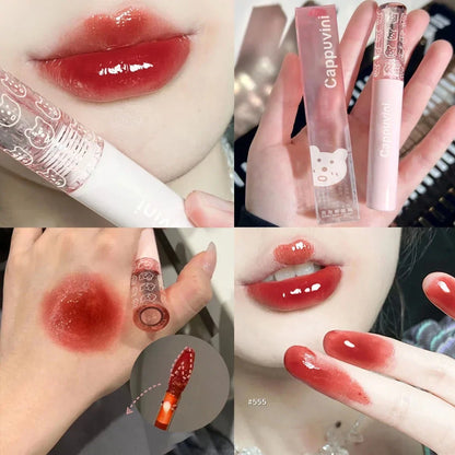 Blushimmer Cherry Pink Mirror Water Lip Gloss displaying glossy, moisturizing lip oil with a cherry pink tint in a clear container.
