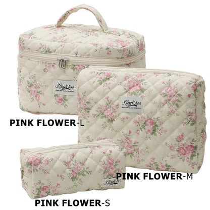 Cute quilted cotton makeup bag by Blushimmer, zipper closure, portable cosmetic organizer with cloth hand handle and box shape design.