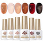Six bottles of Blushimmer Born Pretty crystal amber gel nail polish set in jelly pink and nude shades for winter manicure.