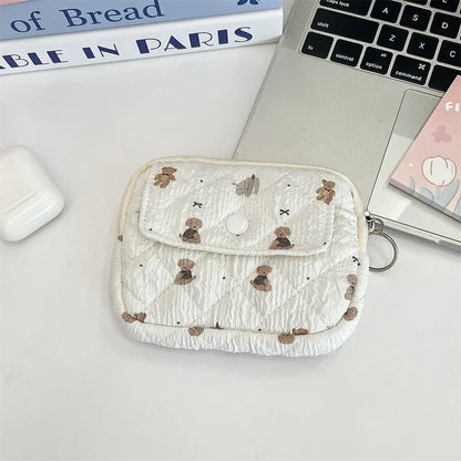 Blushimmer cute cartoon small travel cosmetic bag with lipstick, earphone, and card storage, ideal for makeup and accessories.