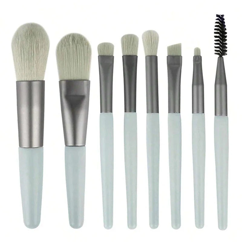 Set of 13 Blushimmer makeup brushes including eye shadow, foundation, blush, and beauty tools in a soft cosmetic brush bag.