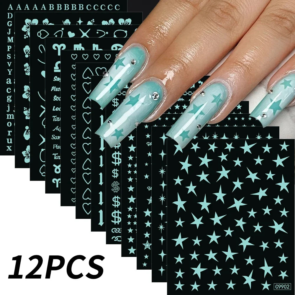 12pcs Blushimmer bronzing laser star nail stickers with 3D alphabet, heart, and flower designs for DIY gradient manicure art.