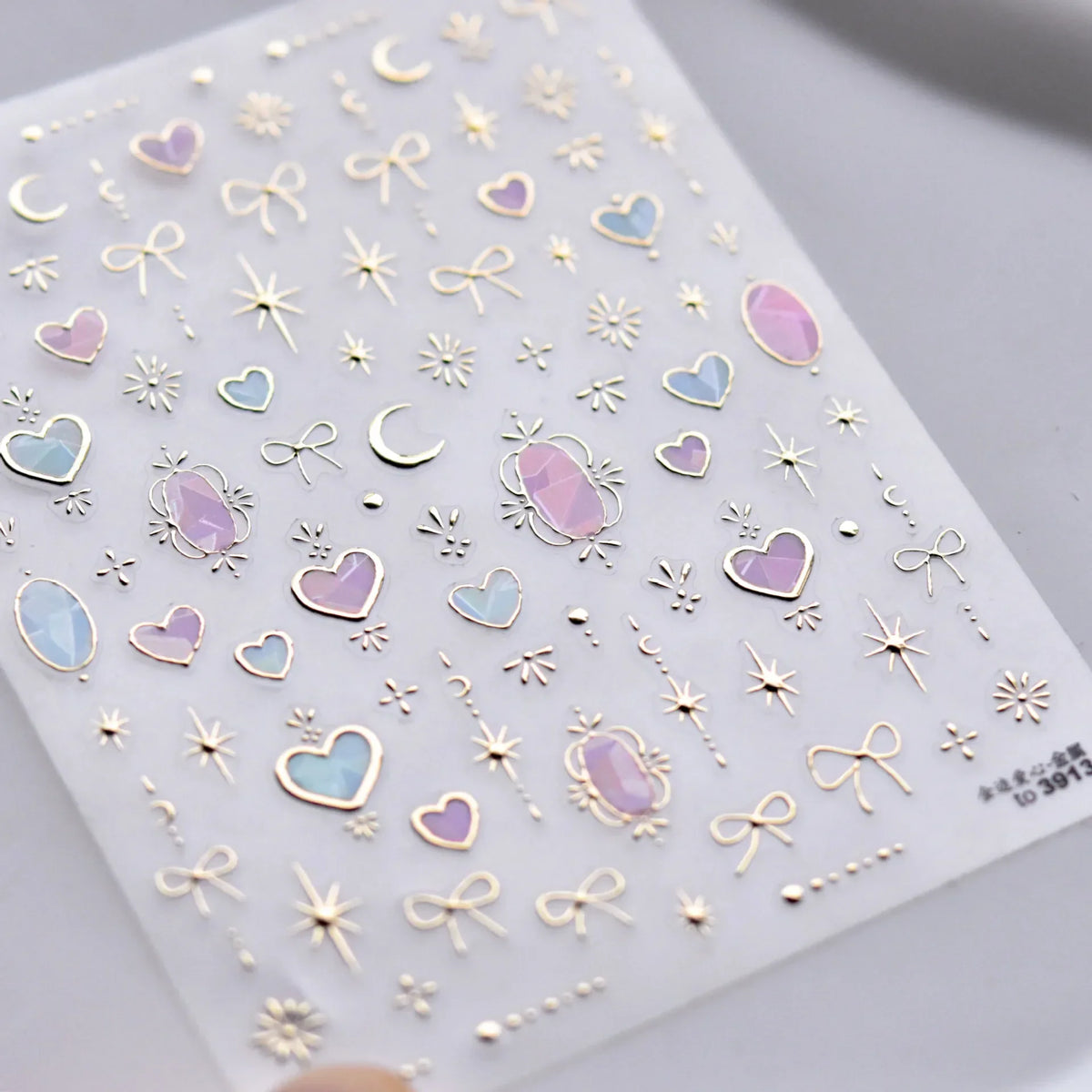 Colorful Cat's Eye 5D gradient European love heart gem nail art stickers with wing and geometric designs for manicure decoration.