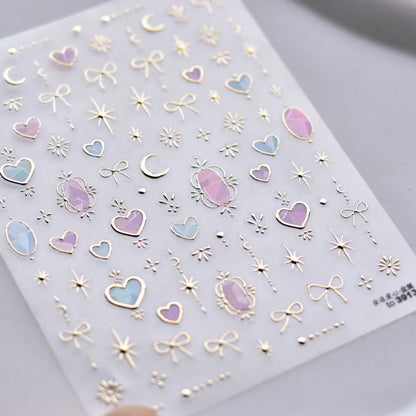 Colorful Cat's Eye 5D gradient European love heart gem nail art stickers with wing and geometric designs for manicure decoration.