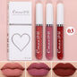Set of four liquid lipsticks by Blushimmer in black, blue, purple, and green with matte finish and long-lasting waterproof formula.
