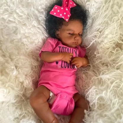 Lifelike 20-inch black Reborn baby doll with soft cloth body, realistic features, perfect for birthdays or Christmas gifts.