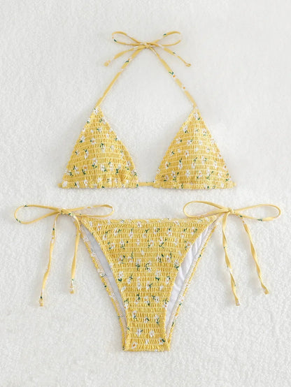 Luxlife Brands floral tie halter high-waist micro bikini set with wrinkled print, beachwear swimwear, and thong bottom on a model.