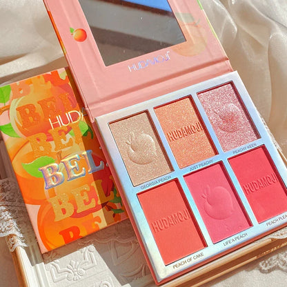 Blushimmer six-color blush highlighter eyeshadow palette with pink shades, glitter accents, and natural contour options for makeup.