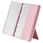 Blushimmer portable three-sided LED makeup mirror with adjustable lighting, ideal for travel and quick touch-ups.