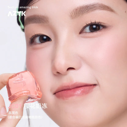 Blushimmer AZTK Blush Designer Color face makeup with natural, long-lasting liquid and cream cheek rouge in glossy muddy shade.
