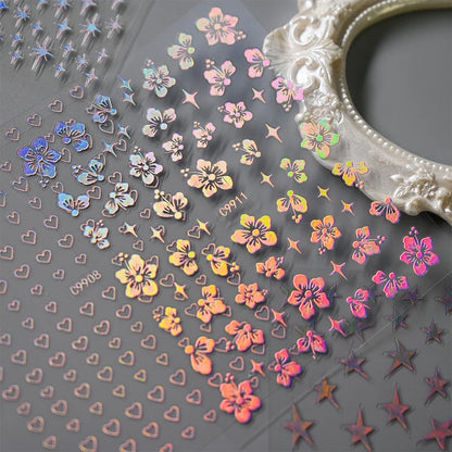 12pcs Blushimmer bronzing laser star nail stickers featuring 3D alphabet, heart, flower designs for DIY gradient manicure.