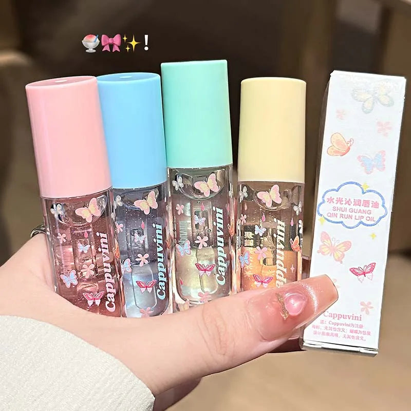 Blushimmer moisturizing shimmer lip gloss with hydrating jelly and mirror-like shine, displaying a glossy, shimmering lip finish.