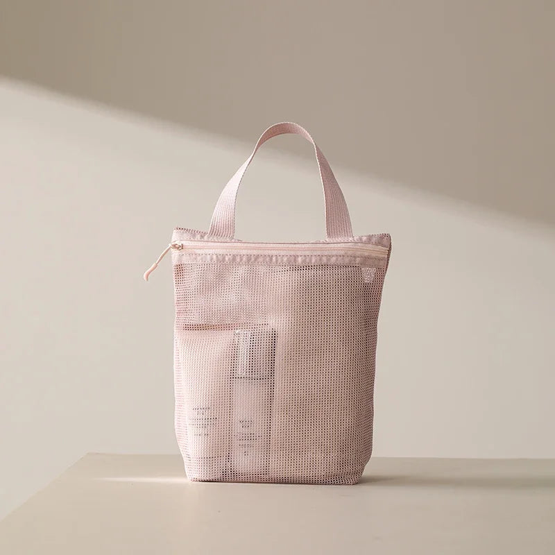 Blushimmer portable toiletry bag with handle, large capacity mesh storage, ideal for travel and business trips.