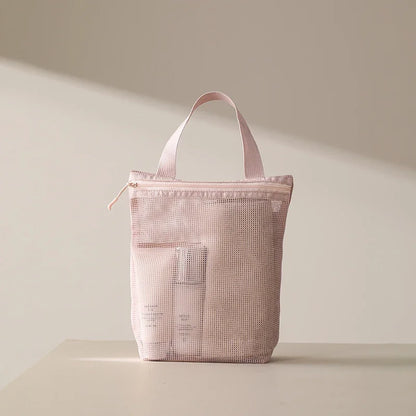 Blushimmer portable toiletry bag with handle, large capacity mesh storage, ideal for travel and business trips.