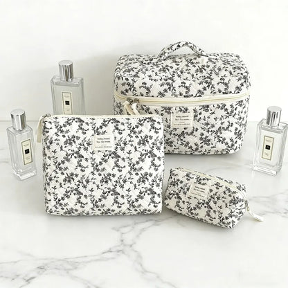Large capacity Blushimmer makeup pouch with multiple compartments, ideal for travel cosmetics and beauty essentials.