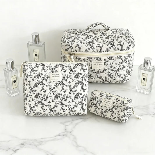 Large capacity Blushimmer makeup pouch with multiple compartments, ideal for travel cosmetics and beauty essentials.