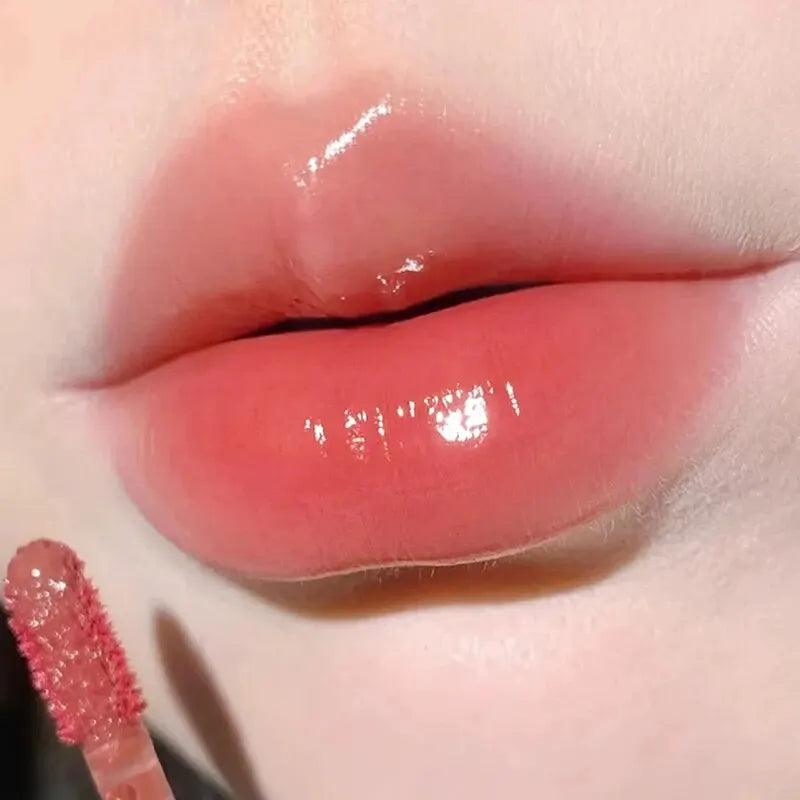 Blushimmer HERORANGE HR567 transparent ice velvet lip glaze in matte finish, showcasing a sleek lipstick and lip gloss with a smooth texture.