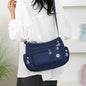 Blue OBA ladies crossbody handbag with sleek design, compact size, and adjustable strap, perfect for travel and everyday use.