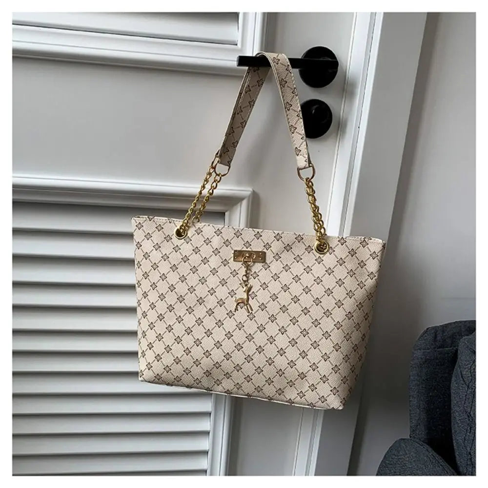 Women luxury tote bag with large capacity, stylish printed design, shoulder strap, perfect for shopping and daily use.