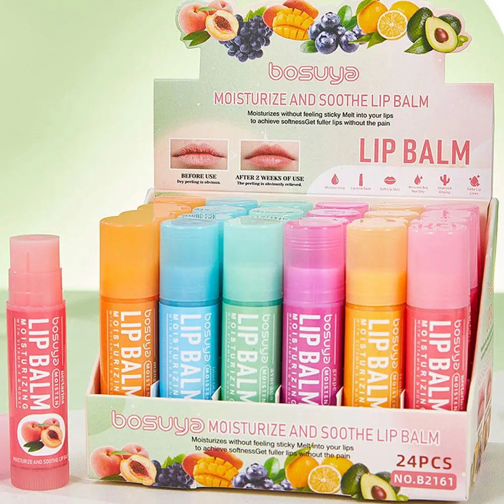 Assorted fruit flavor lip balm set by Blushimmer with six colorful tubes, hydrating and nourishing for dry lips and fine lines.
