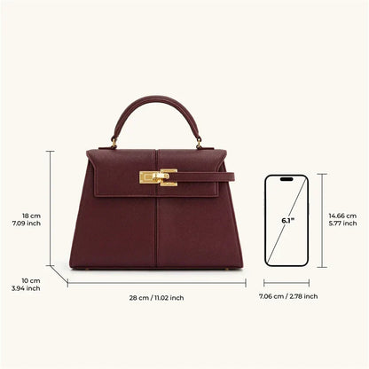 Wine red women's OBA crossbody handbag with a sleek satchel design, featuring a top handle and adjustable strap.