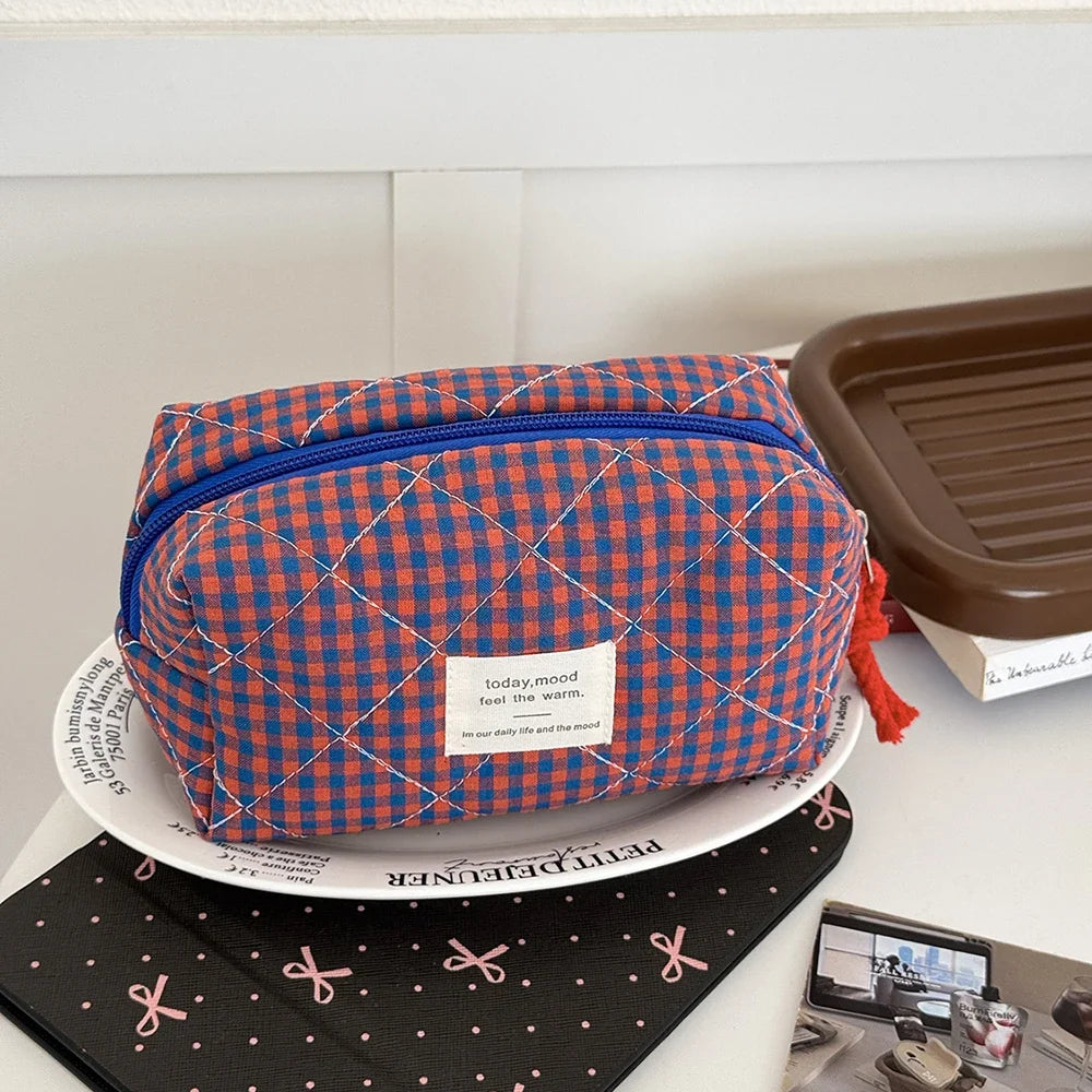 Pink Blushimmer Airfriend makeup bag with soft, cute cosmetic design, ideal for women's travel toiletry and cosmetic organization.