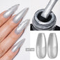 Blushimmer metallic gel nail polish in red with gold and silver mirror finish, featuring glitter and sparkly effects in 7ml bottle