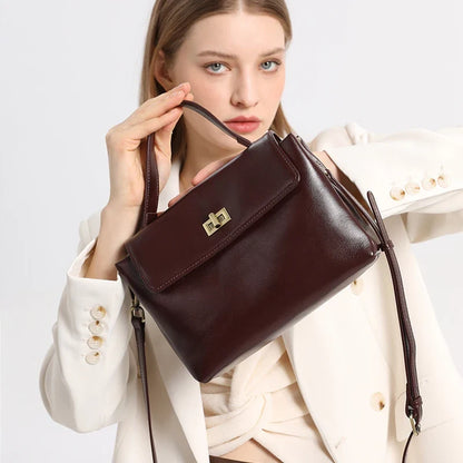 Women's genuine leather crossbody satchel from NNEOBA with adjustable strap and spacious interior, casual shoulder bag for everyday use.