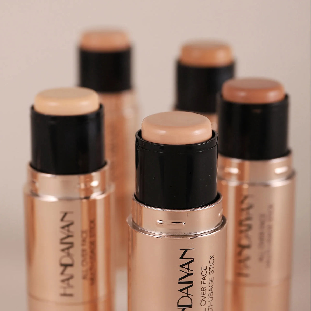 Blushimmer double-head face bronzer contour stick with brush, featuring light and dark shades for contouring and facial brightening.