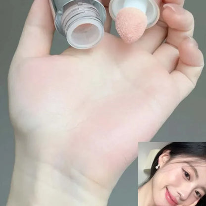 Blushimmer HERORANGE liquid blush in a natural, low-saturation matte finish enhancing a soft, natural complexion.