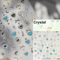 Colorful Cat's Eye 5D gradient European love heart gem nail art stickers with geometric wing shapes from Blushimmer for manicure decoration.