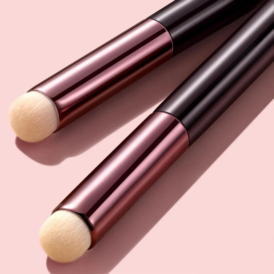 Blushimmer lip brush concealer and lipstick applicator with a slender, multifunctional design for precise lip makeup application.