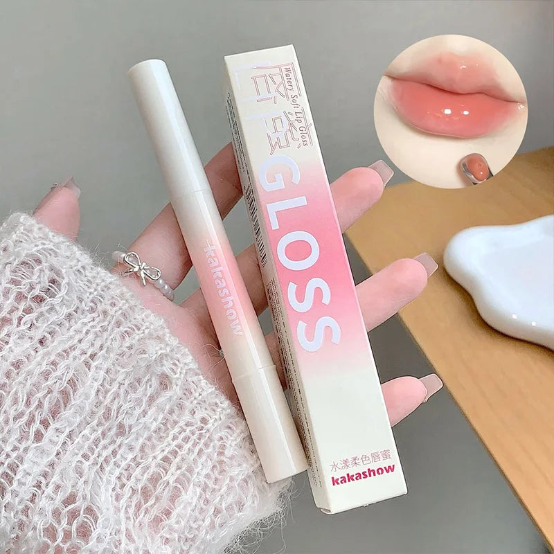 Kakashow Mirror Watery Lip Gloss by Blushimmer featuring a moisturizing jelly lip tint in a clear, shiny tube with a silver cap.
