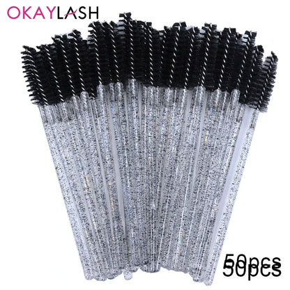 Set of 100 disposable eyelash extension brushes and spoolies by Blushimmer, micro mascara wands and combs for precise lash application.