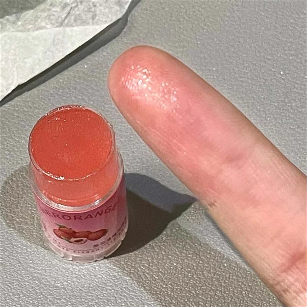Transparent coconut lip balm by Blushimmer, moisturizing jelly lip gloss with hydrating, anti-drying formula and fine line fade.