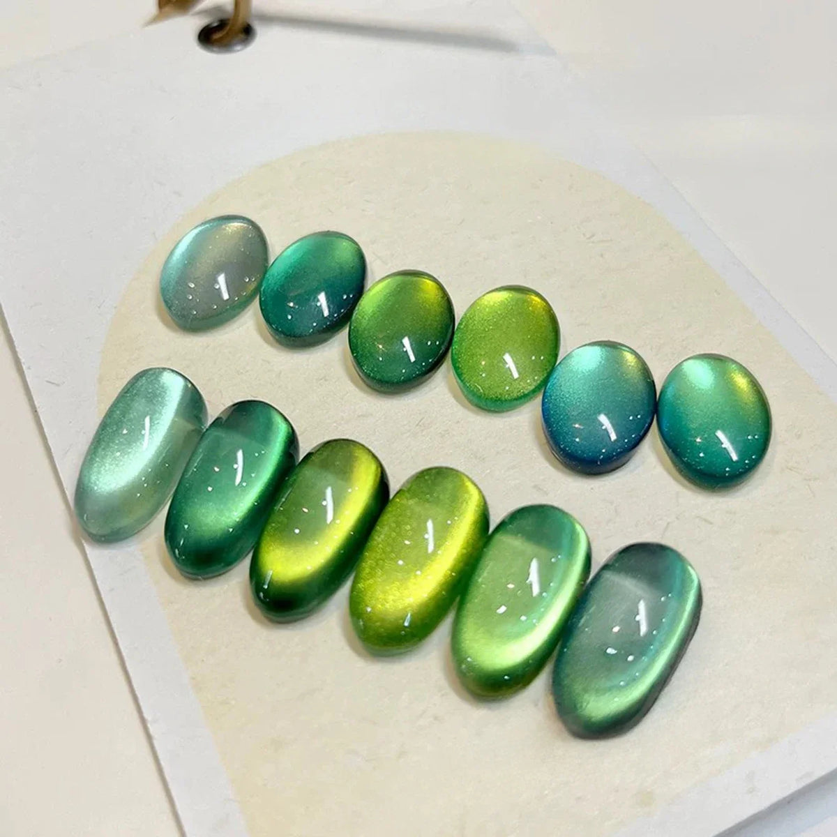 Blushimmer MIANEL 12ml Emperor Green cat eye gel nail polish showing vibrant green color and glossy finish.