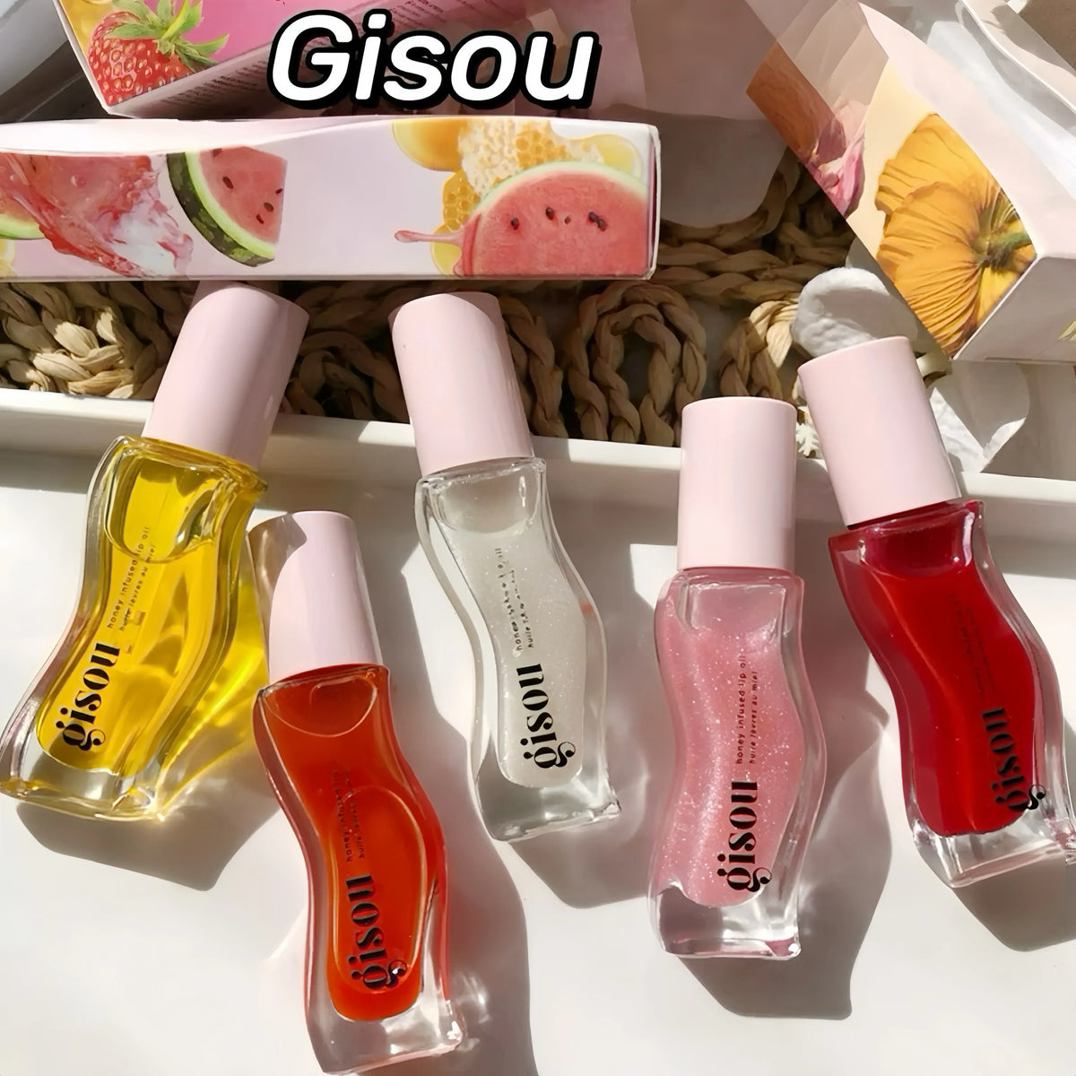 Blushimmer Gisou moisturizing lip balm and gloss with plumping and exfoliating benefits, shown in a sleek lip care tube.