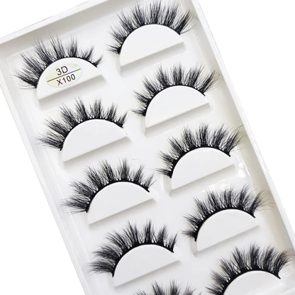 Five pairs of natural 3D mink false eyelashes in black, designed for makeup and beauty, featuring a cat-eye style.