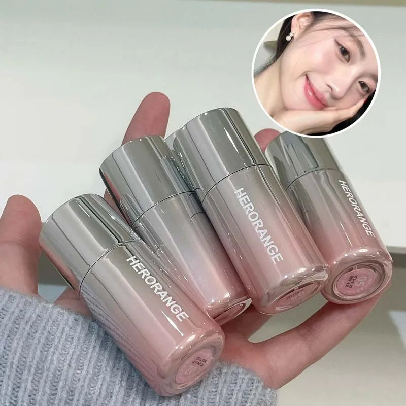 Blushimmer HERORANGE liquid blush in soft matte peachy-orange shade, enhancing natural complexion with a low-saturation finish