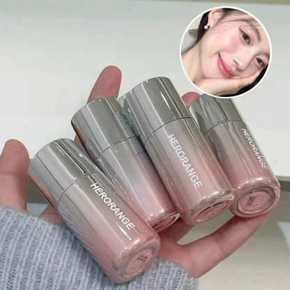 Blushimmer HERORANGE liquid blush in soft matte peachy-orange shade, enhancing natural complexion with a low-saturation finish