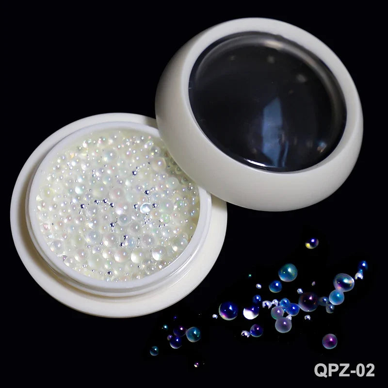White acrylic flower nail art decorations with mixed size rhinestones and colorful gems for DIY manicure designs.