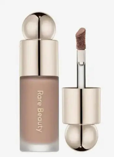 Blushimmer Rare Beauty bronzer stick with creamy, blendable formula for natural sun-kissed face sculpting and contouring.
