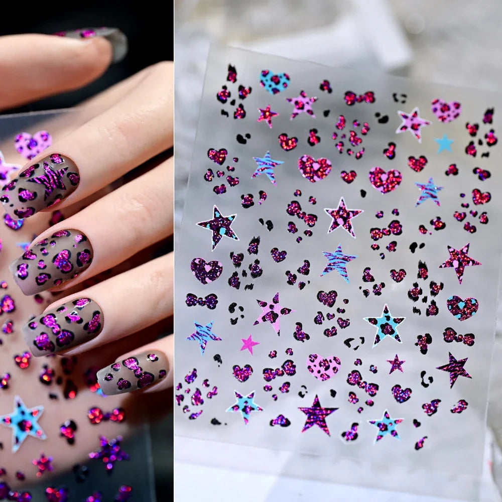 Pink and black 5D leopard print nail art stickers by Blushimmer on a transparent sheet for DIY manicure decoration.